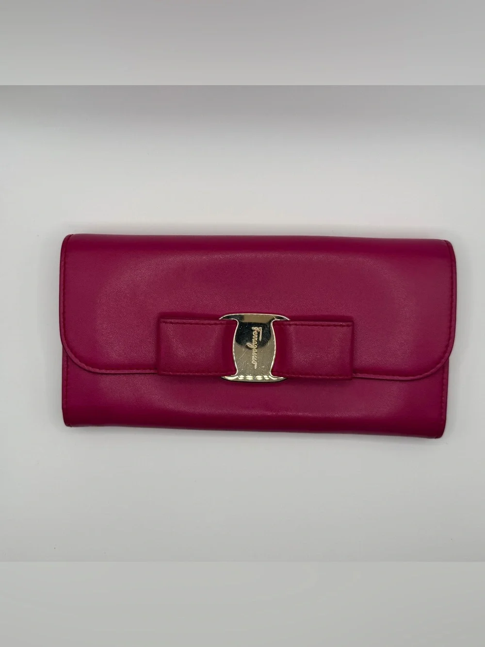 Salvatore Ferragamo Fuchsia Vara Bow Clutch with Gold Hardware